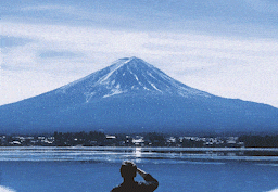 Animated GIF depicting Jonty by lake Kawaguchi, with Mt. Fuji in the background.